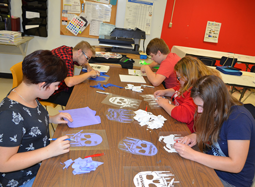 Students working at vinyl  station